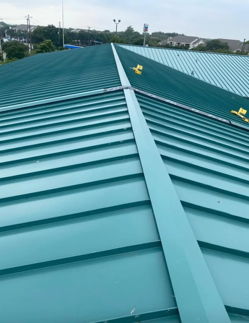 Green commercial metal roof ridge and valley for Metal Roof Repair in Forest Acres